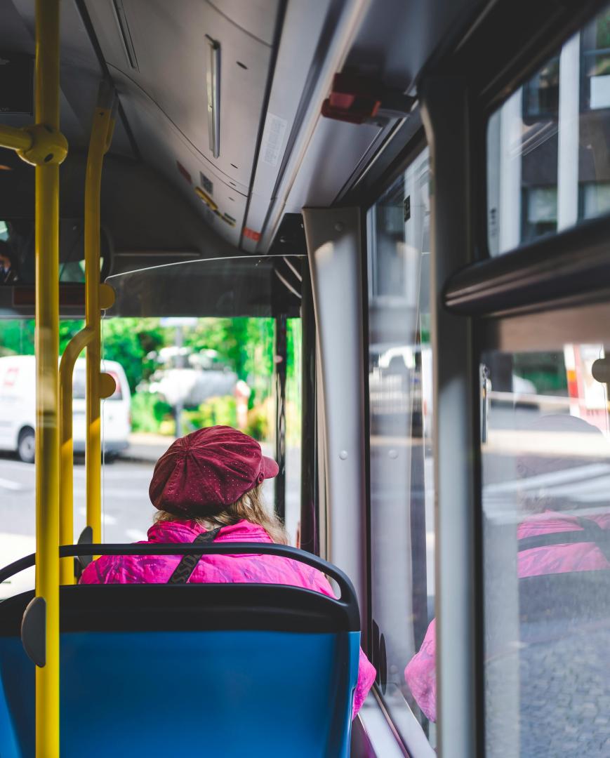 Person sitting on bus