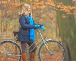 lady on bike in autumn