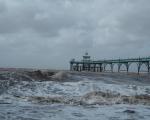 Clevedon Pier and a stormy sea with black clouds