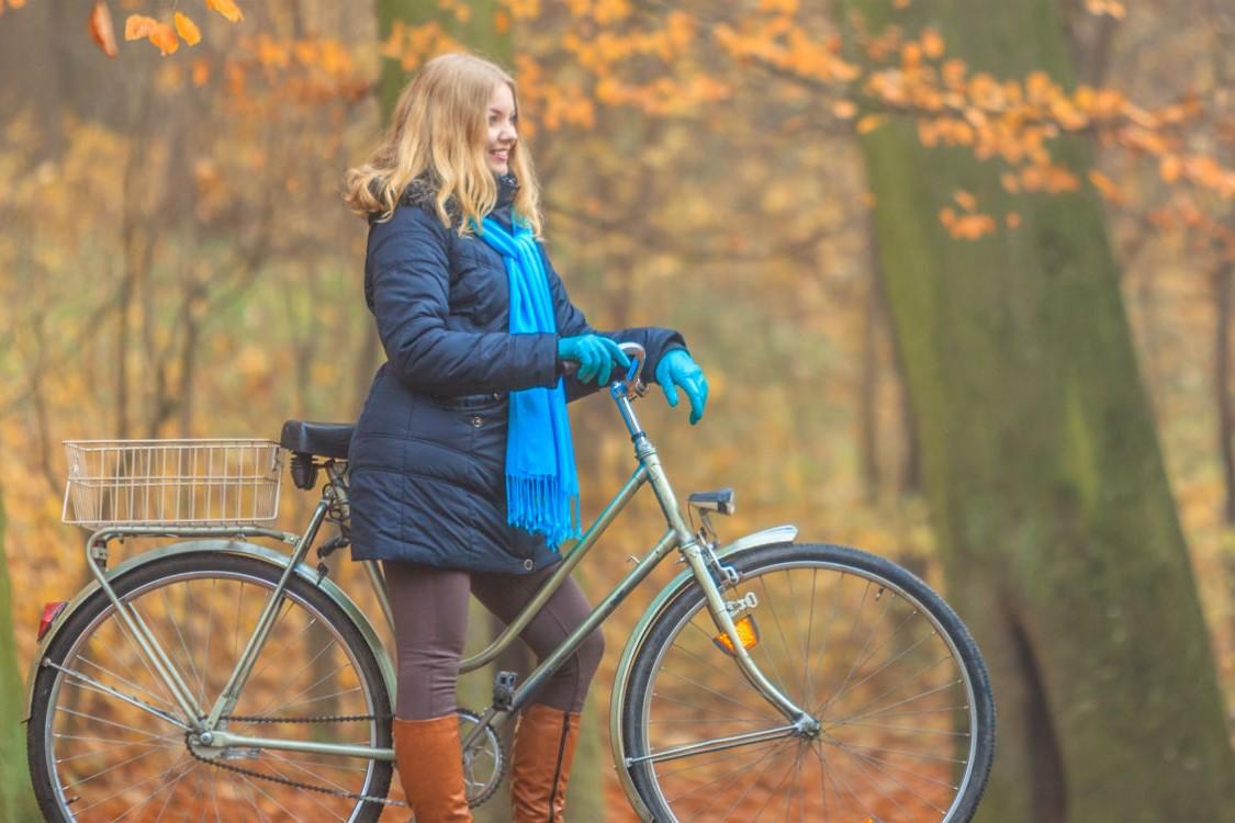 lady on bike in autumn