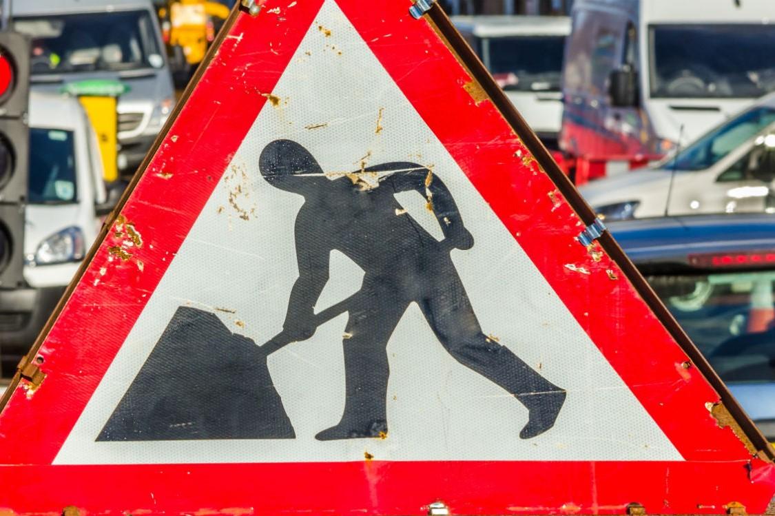 workmen sign