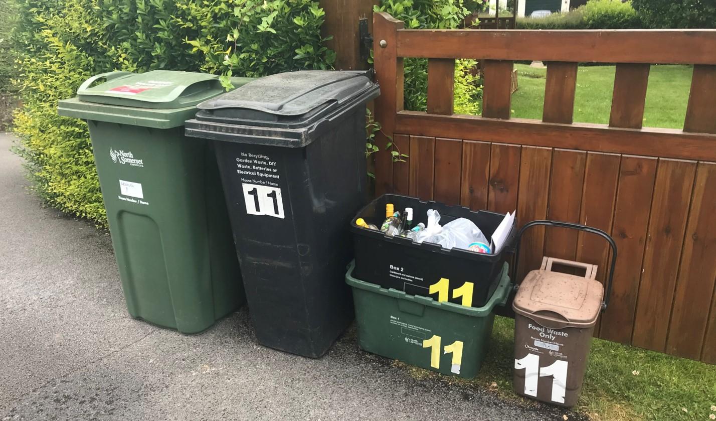 North Somerset Council waste bins lined up outside a house ready for collection