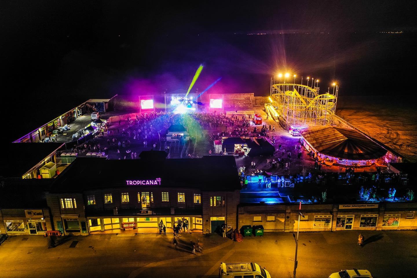 An aerial photo of the Tropicana taken at night while an event is taking place.